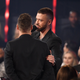 Justin Timberlake and a fan, probably. And by a fan, I mean Ed Sheeran in the bottom-right corner. (via Kevin Winter/Getty Images)